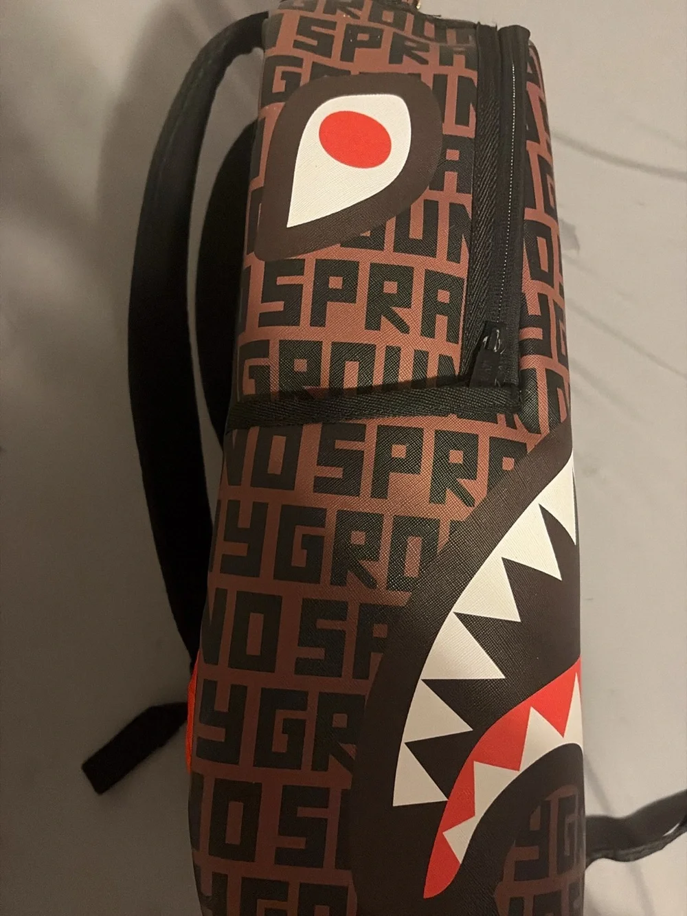 Sprayground Brown Shark-Mouth Logo Backpack with Red & White Accent